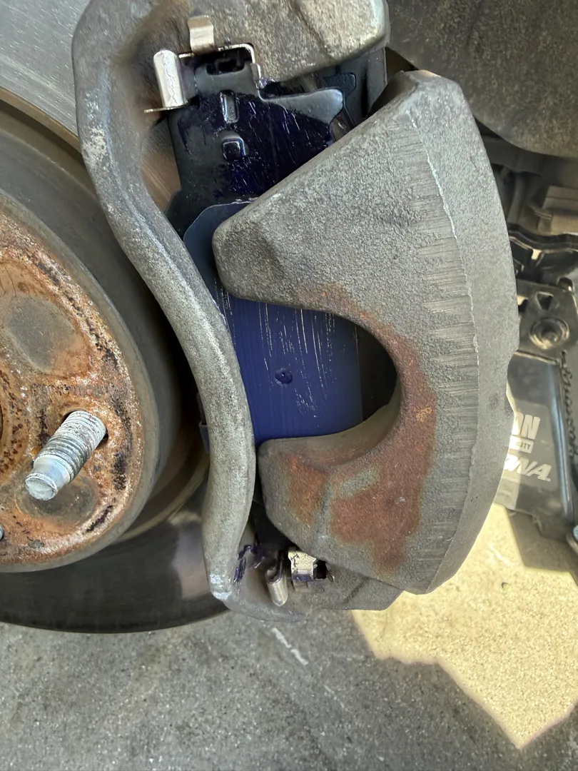 Caliper hung clear of the rotor — Hemet, CA