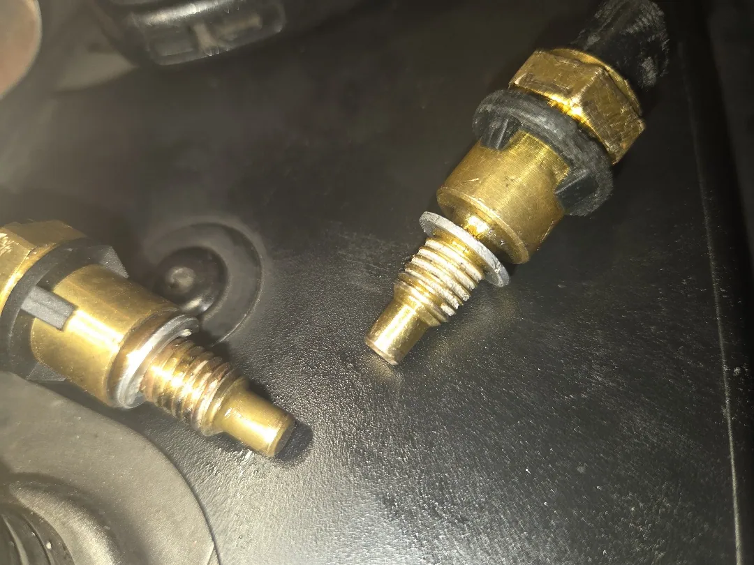 Old coolant temp sensor next to the new one — Moreno Valley, CA
