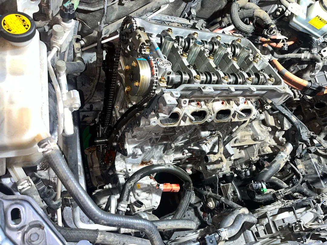 Front of the engine open at the timing cover, chain and guides in view — San Jacinto, CA