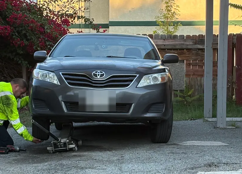 Camry up on the jack at the customer's house — San Jacinto, CA